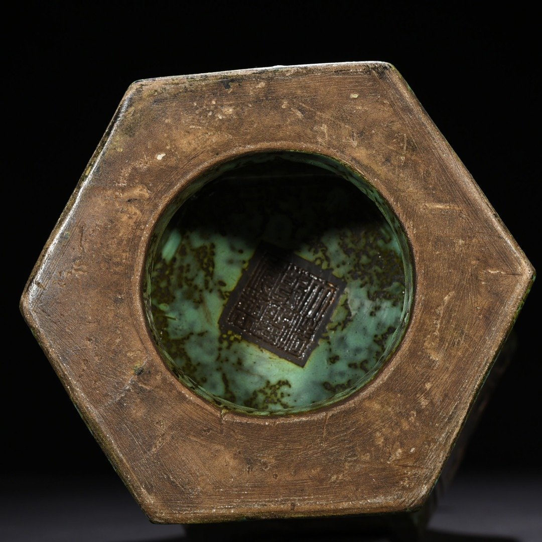 Qing Dynasty Qianlong bronze glaze hexagonal vase with carved chilong pattern