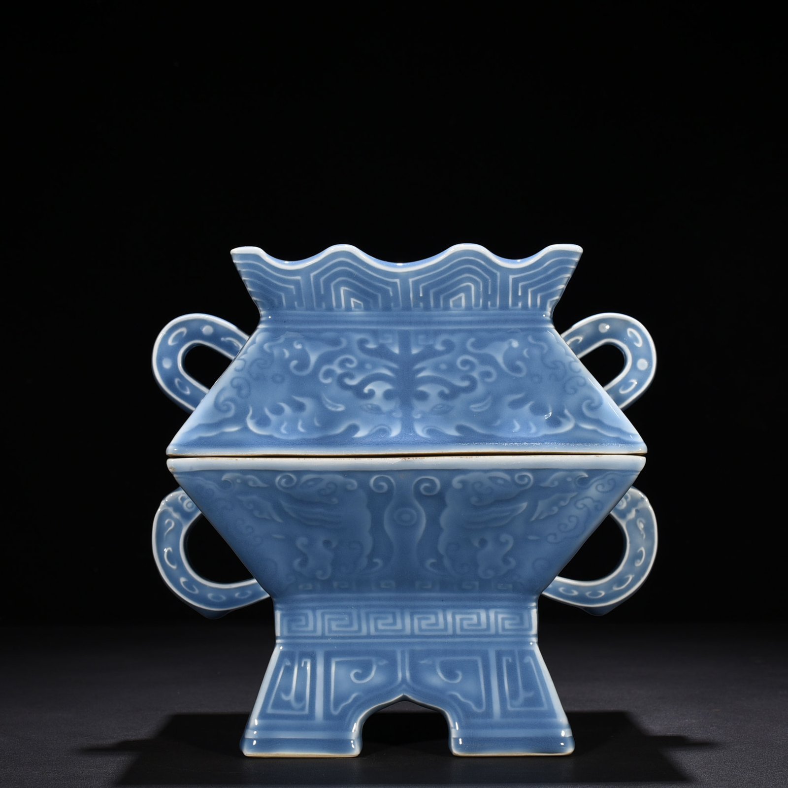 Qing Dynasty Qianlong sky blue glaze engraved Kui phoenix pattern statue