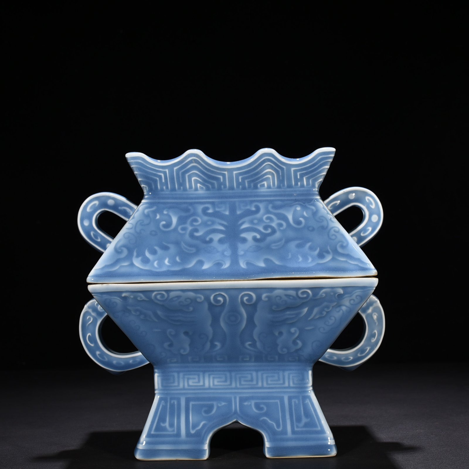 Qing Dynasty Qianlong sky blue glaze engraved Kui phoenix pattern statue