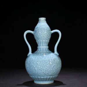 Qing Dynasty Qianlong sky blue glaze carved ruyi ear gourd vase with entwining floral pattern