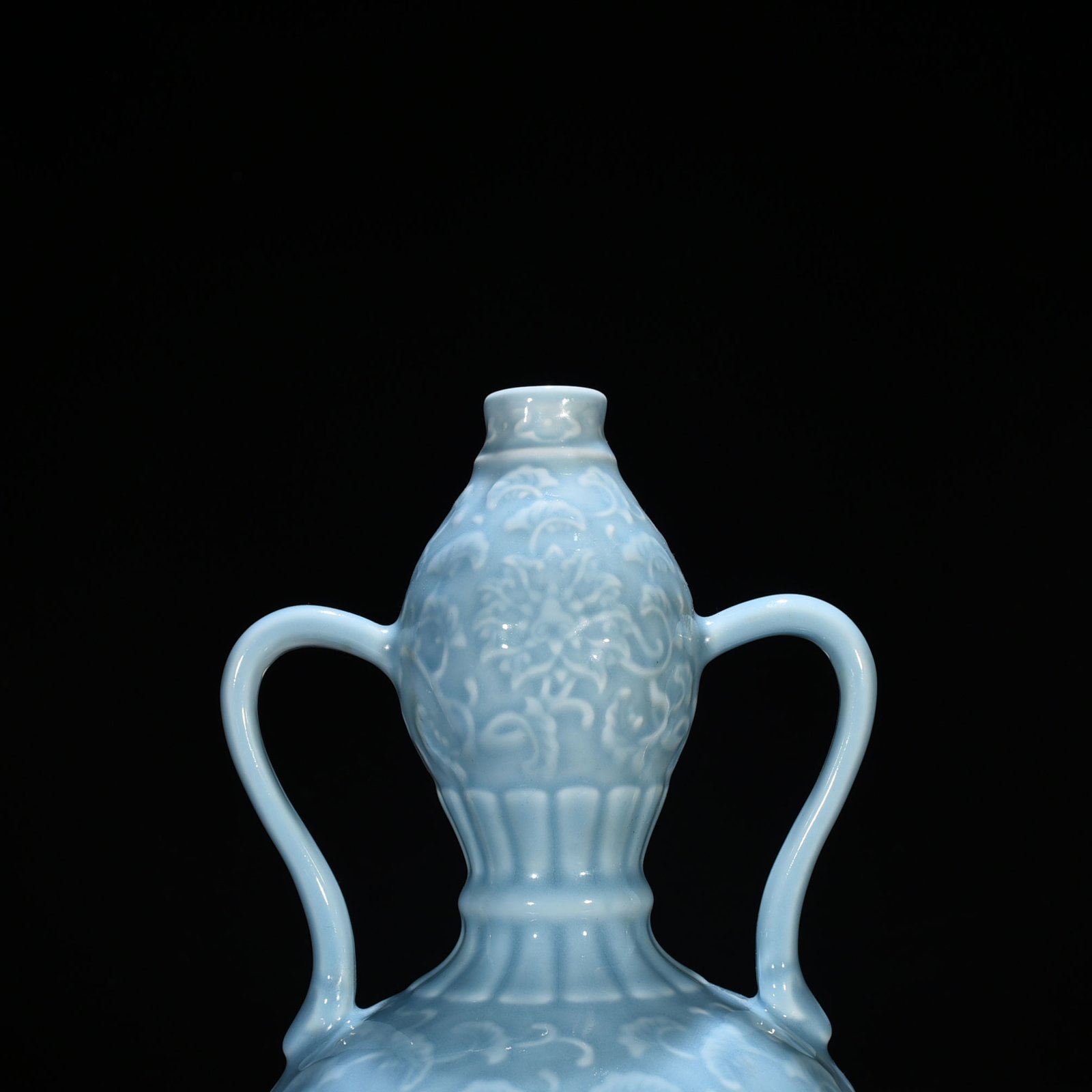 Qing Dynasty Qianlong sky blue glaze carved ruyi ear gourd vase with entwining floral pattern