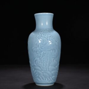 Qing Dynasty Qianlong sky blue glaze engraved dragon pattern vase