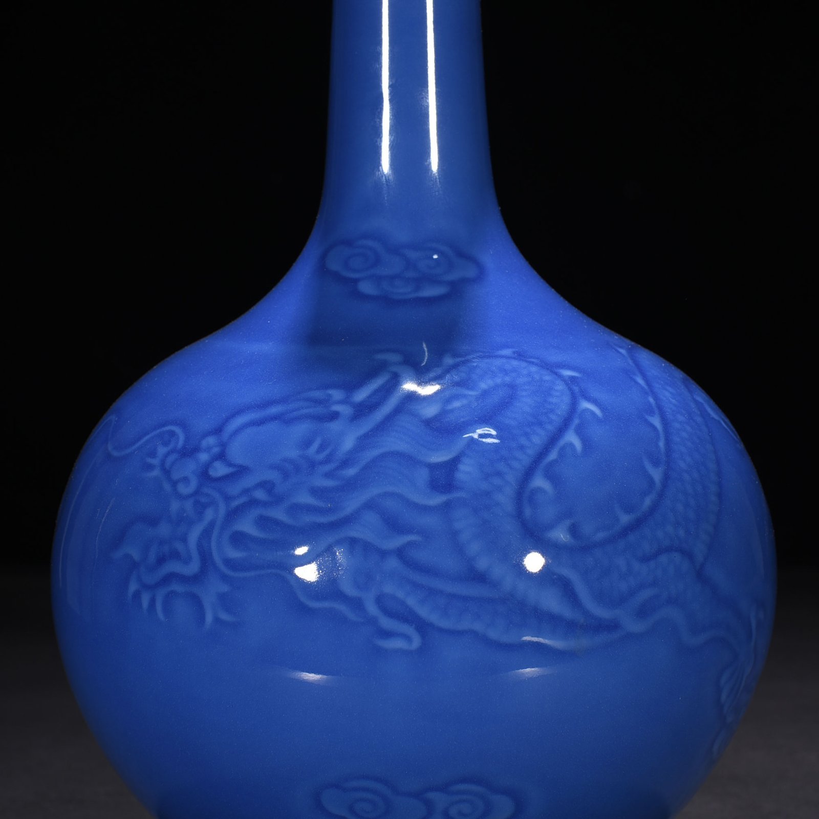 Qing Dynasty Qianlong sky blue glaze engraved dragon pattern bile vase