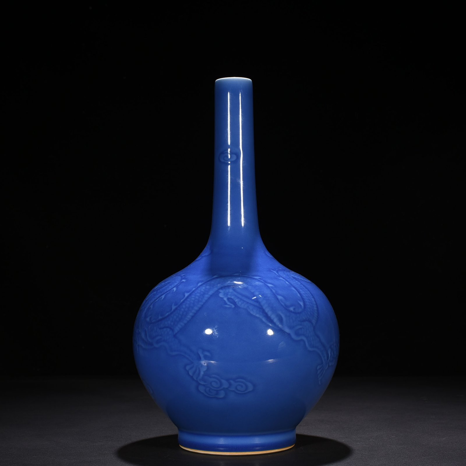 Qing Dynasty Qianlong sky blue glaze engraved dragon pattern bile vase