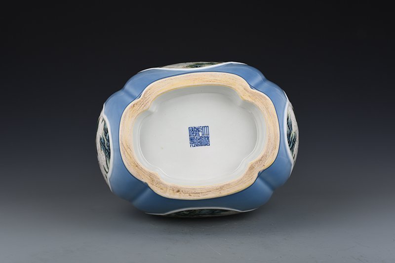 Qing Dynasty Qianlong sky blue glaze consecrated pastel landscape pavilion elephant ear statue