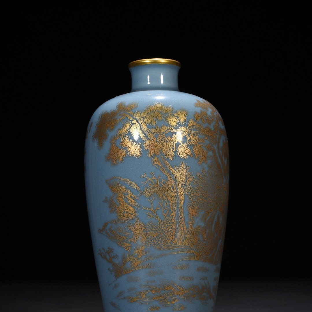 Qing Dynasty Qianlong sky blue glaze plum vase with gold landscape and water patterns