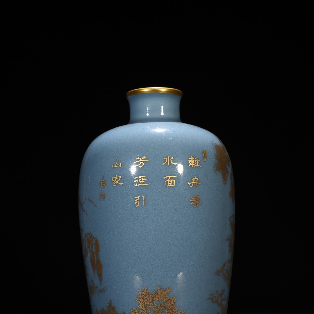 Qing Dynasty Qianlong sky blue glaze plum vase with gold landscape and water patterns