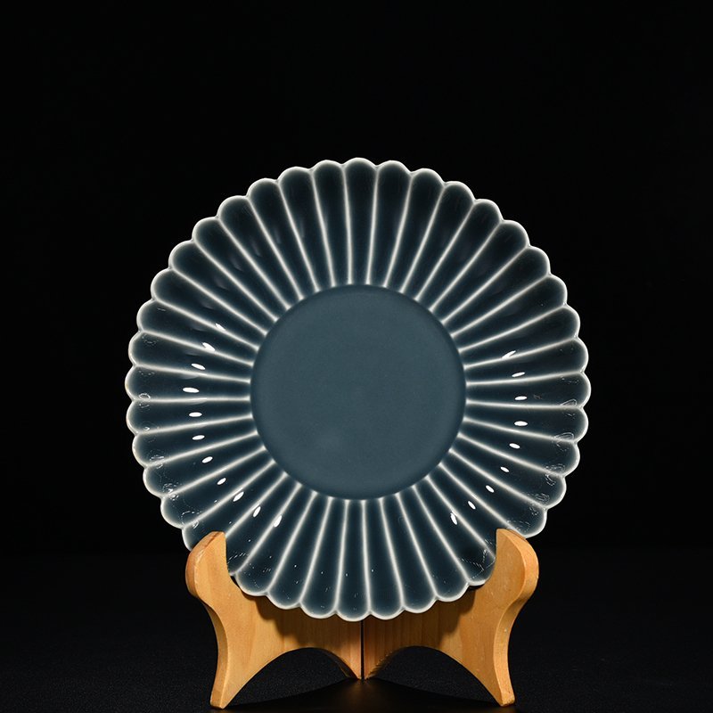 Qing Dynasty Qianlong sky blue glazed chrysanthemum petal dish