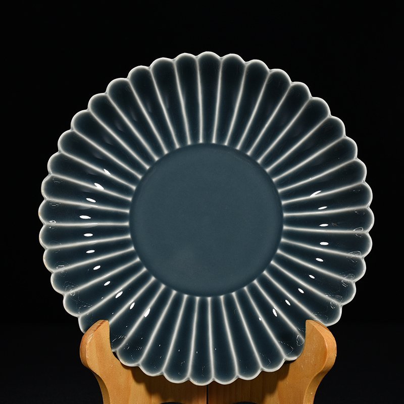 Qing Dynasty Qianlong sky blue glazed chrysanthemum petal dish