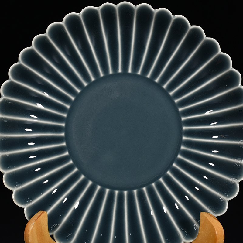 Qing Dynasty Qianlong sky blue glazed chrysanthemum petal dish