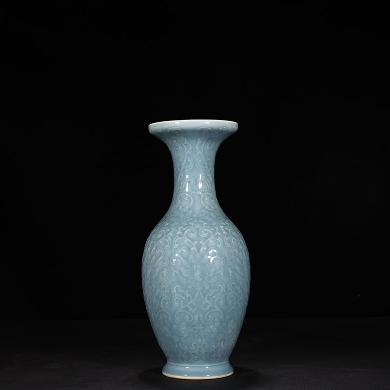 Qing Dynasty Qianlong sky blue glaze carved dish vase with branch and flower pattern