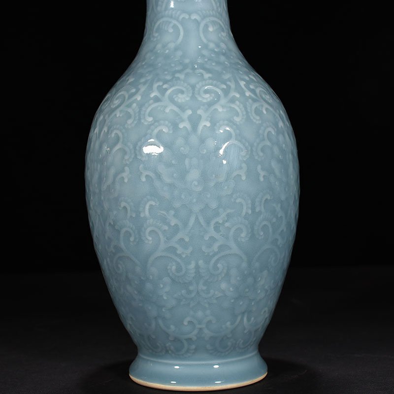 Qing Dynasty Qianlong sky blue glaze carved dish vase with branch and flower pattern