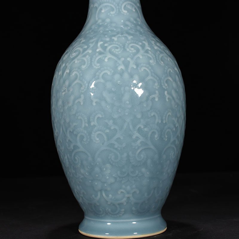 Qing Dynasty Qianlong sky blue glaze carved dish vase with branch and flower pattern