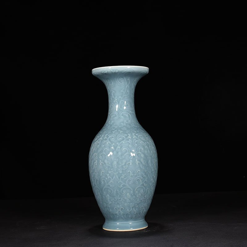 Qing Dynasty Qianlong sky blue glaze carved dish vase with branch and flower pattern