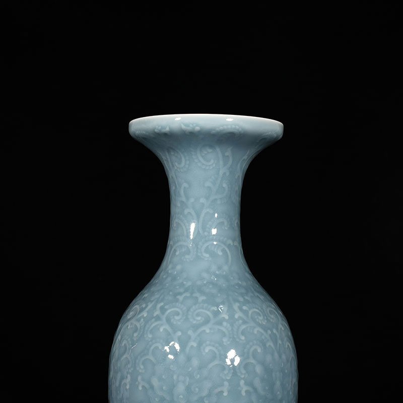 Qing Dynasty Qianlong sky blue glaze carved dish vase with branch and flower pattern