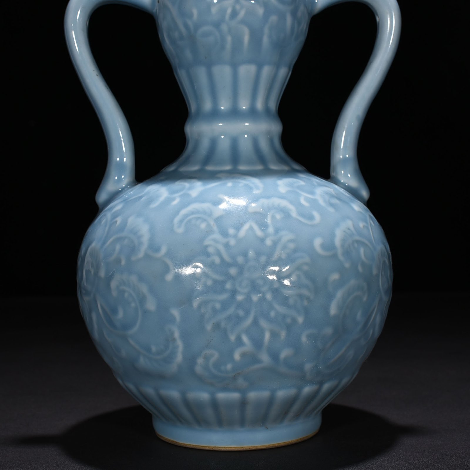 Qing Dynasty Qianlong sky blue glaze carved gourd vase with branches and floral patterns