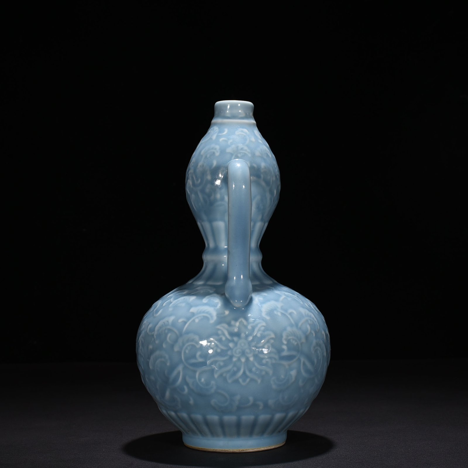 Qing Dynasty Qianlong sky blue glaze carved gourd vase with branches and floral patterns