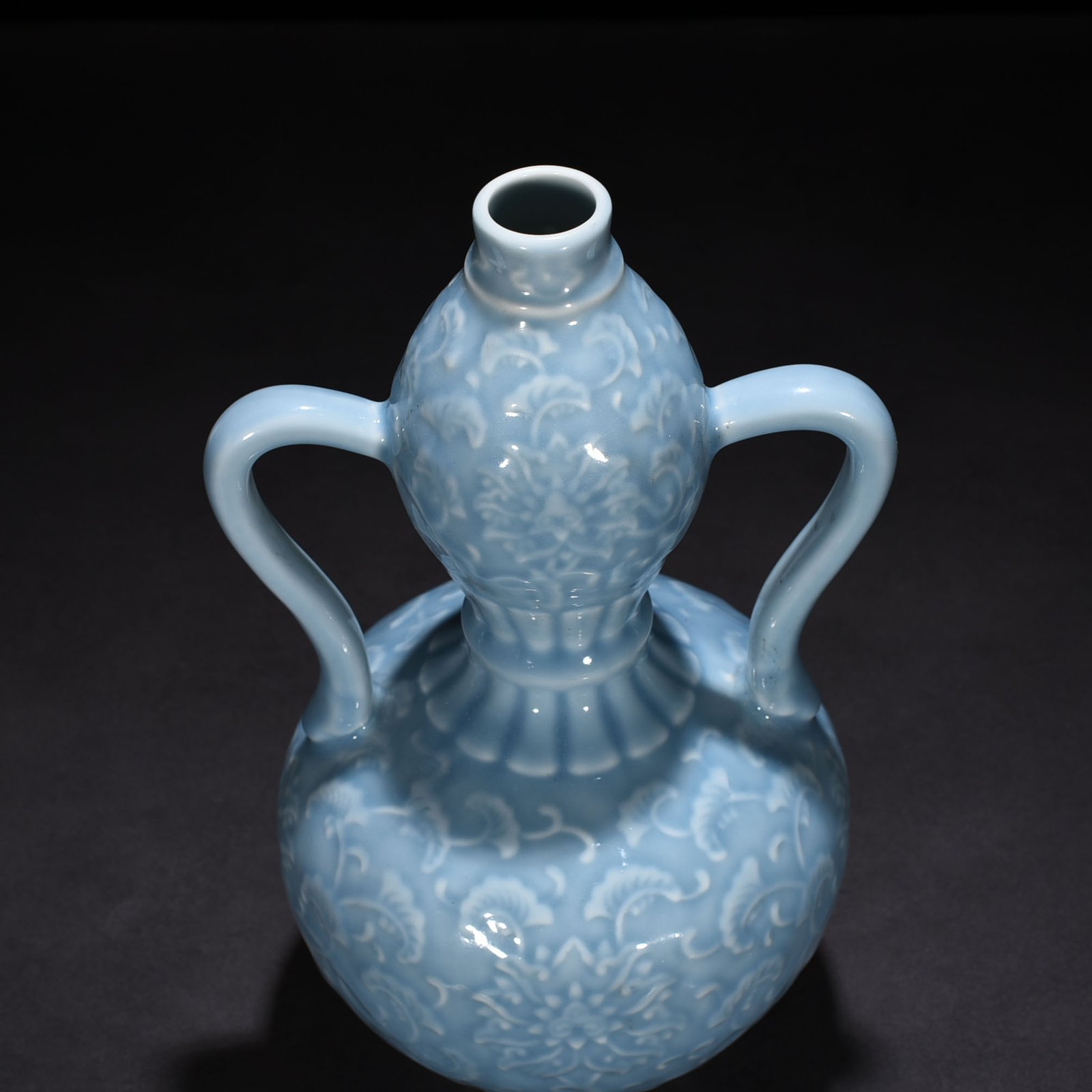 Qing Dynasty Qianlong sky blue glaze carved gourd vase with branches and floral patterns