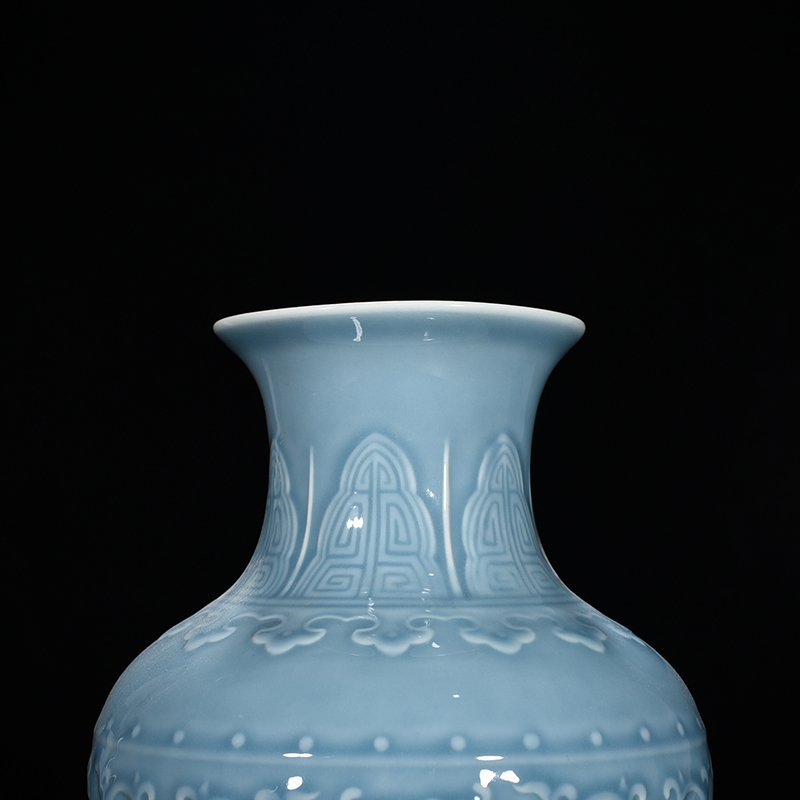Qing Dynasty Qianlong azure glaze carved fishtail vase with floral pattern
