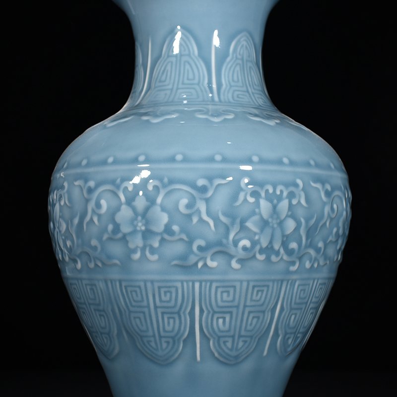 Qing Dynasty Qianlong azure glaze carved fishtail vase with floral pattern