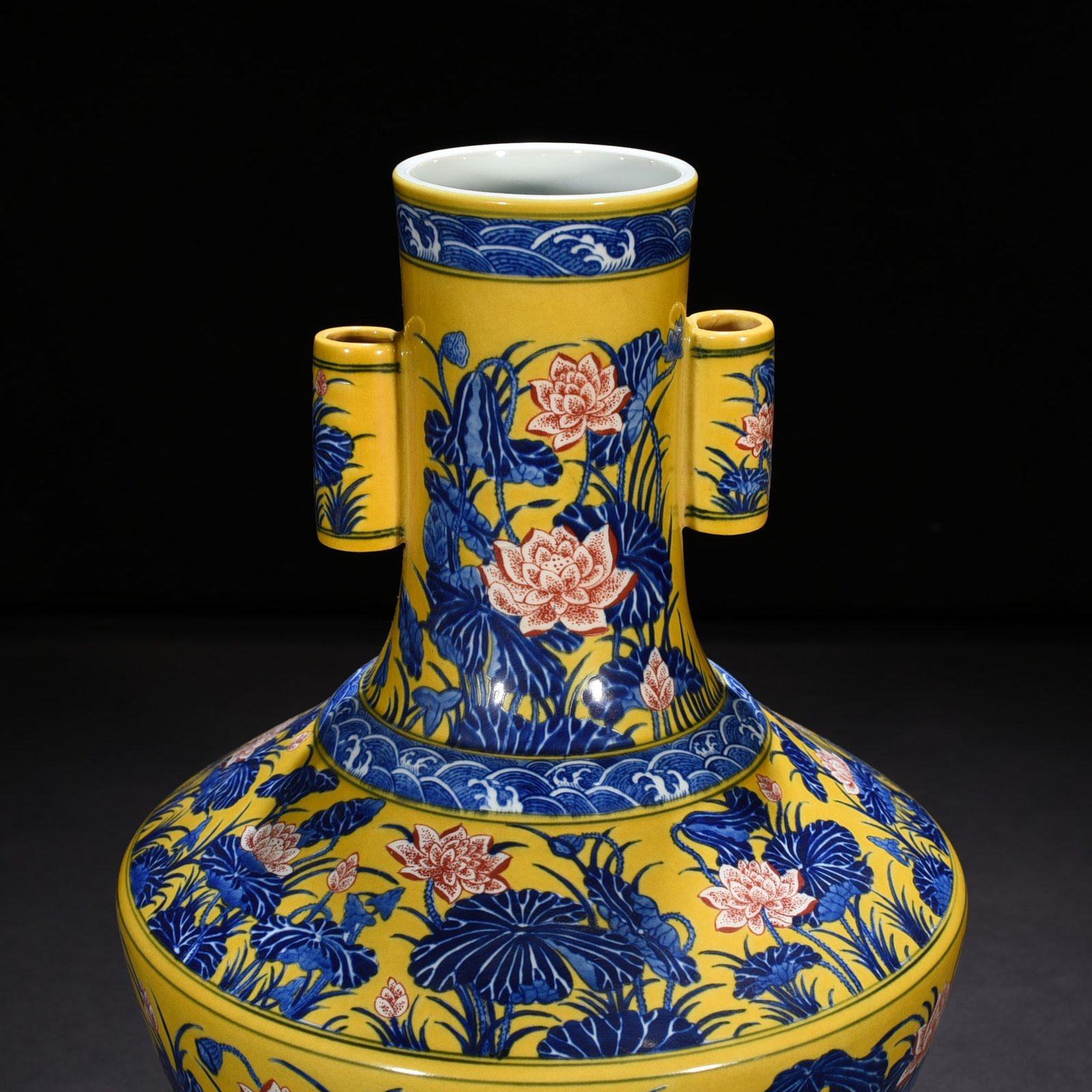 Qing Dynasty Qianlong delicate yellow glaze blue and white underglaze red lotus pattern through-ear vase