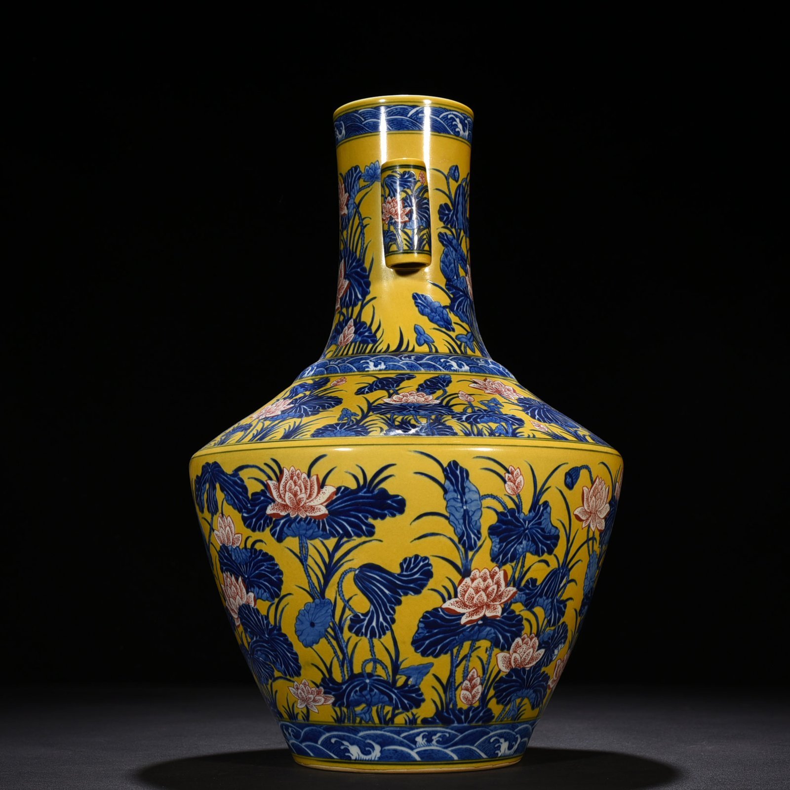 Qing Dynasty Qianlong delicate yellow glaze blue and white underglaze red lotus pattern through-ear vase