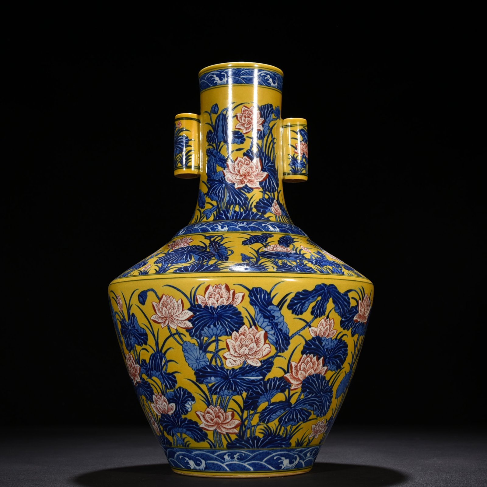 Qing Dynasty Qianlong delicate yellow glaze blue and white underglaze red lotus pattern through-ear vase