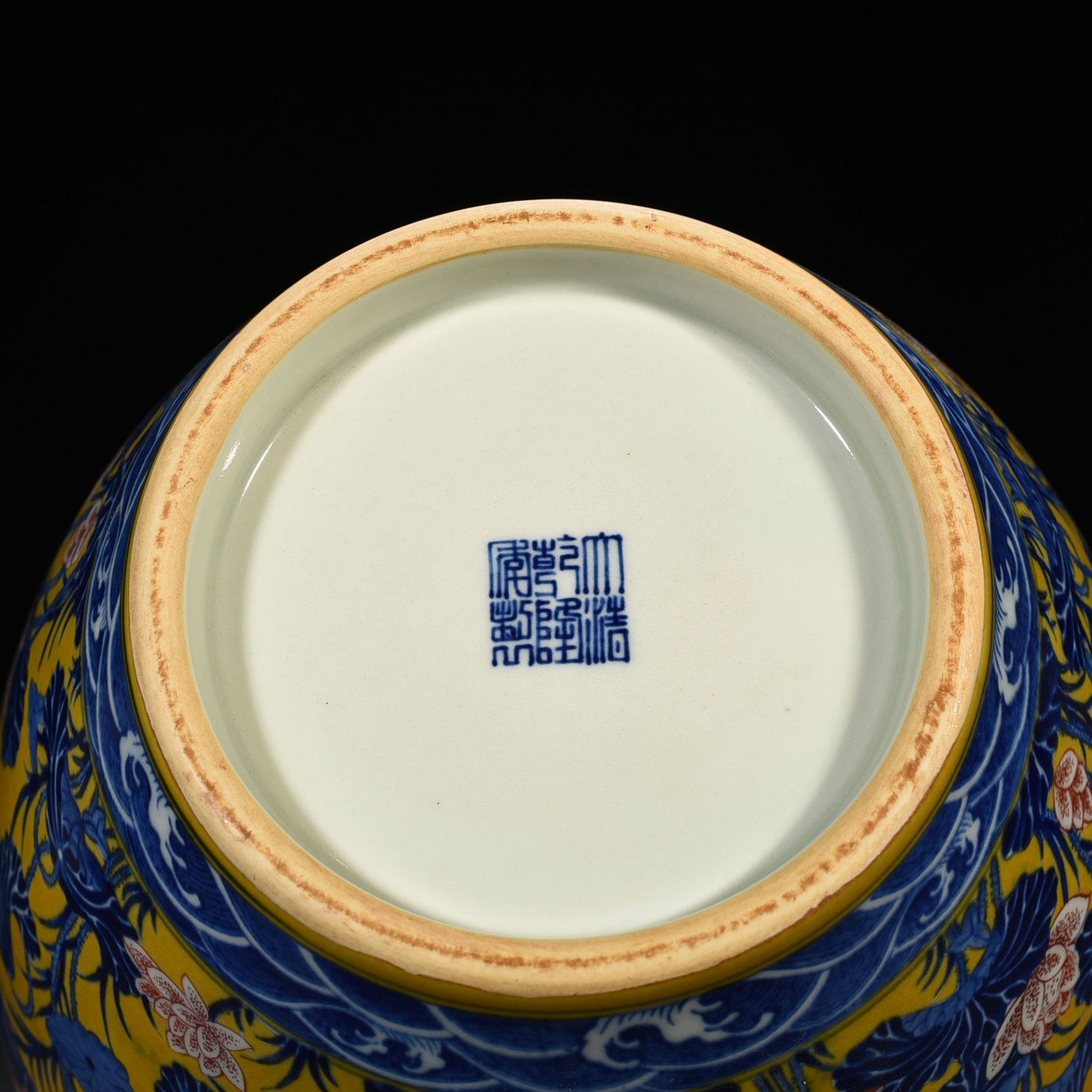 Qing Dynasty Qianlong delicate yellow glaze blue and white underglaze red lotus pattern through-ear vase