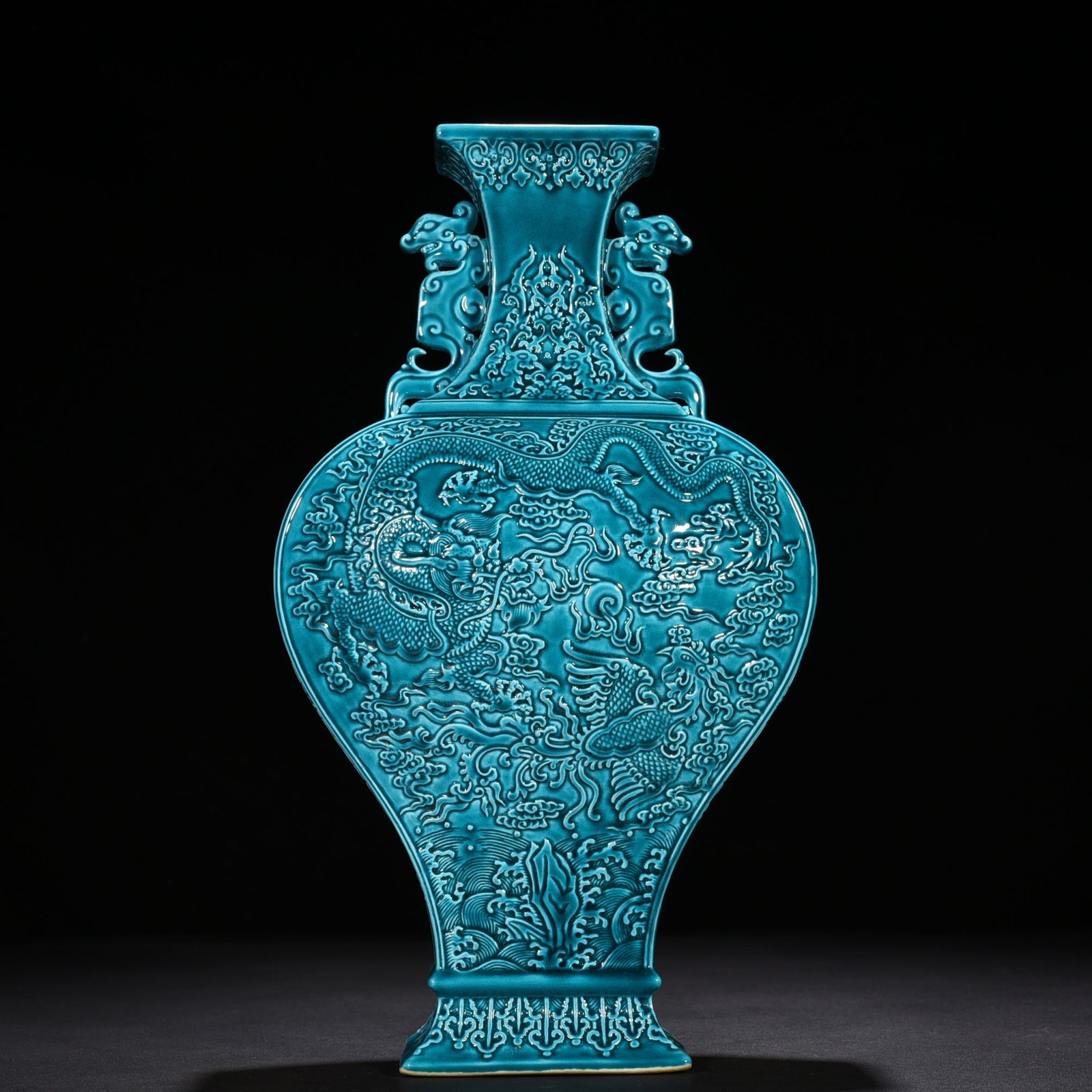 Qing Dynasty Qianlong peacock blue glaze flat vase with dragon and phoenix patterns