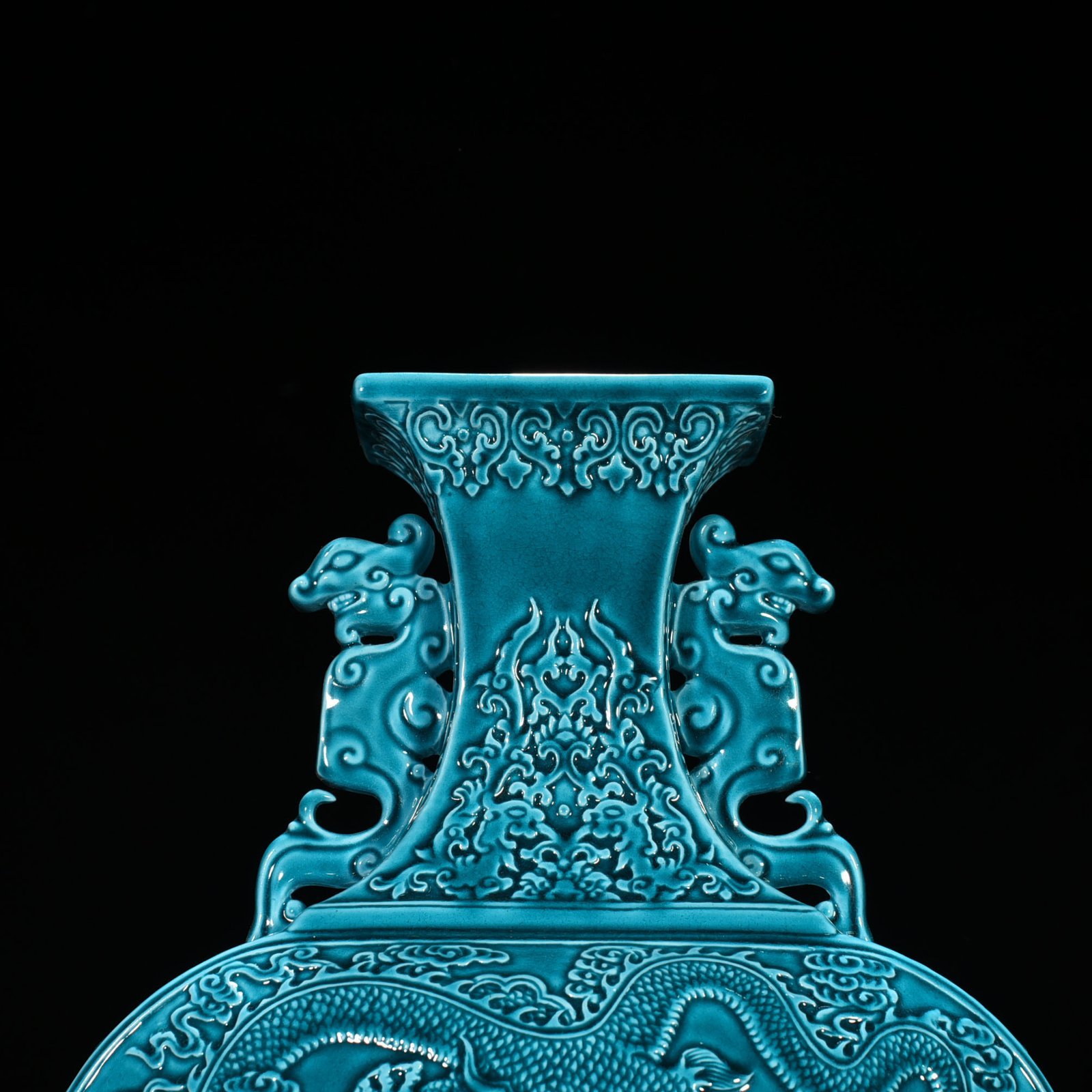 Qing Dynasty Qianlong peacock blue glaze flat vase with dragon and phoenix patterns