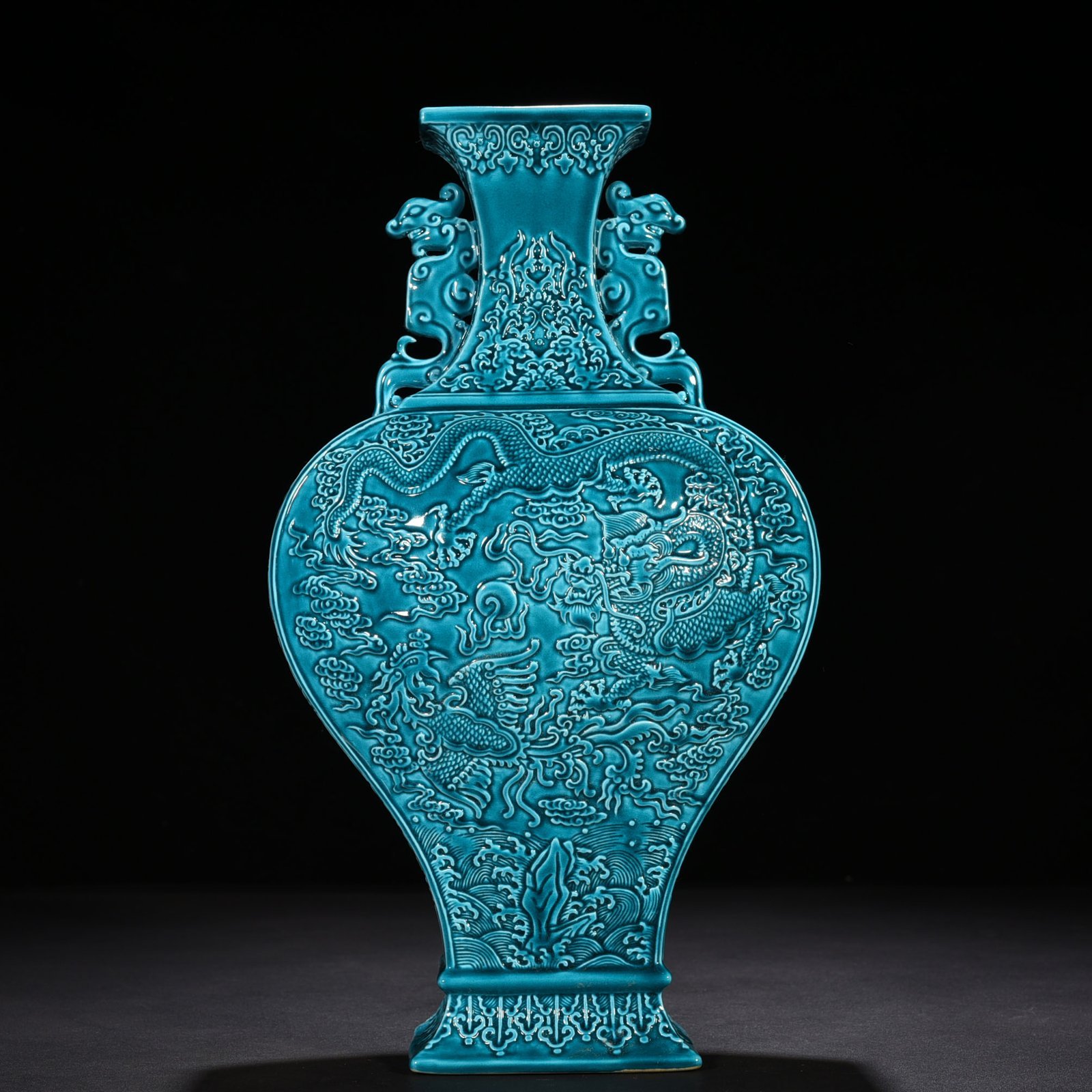 Qing Dynasty Qianlong peacock blue glaze flat vase with dragon and phoenix patterns