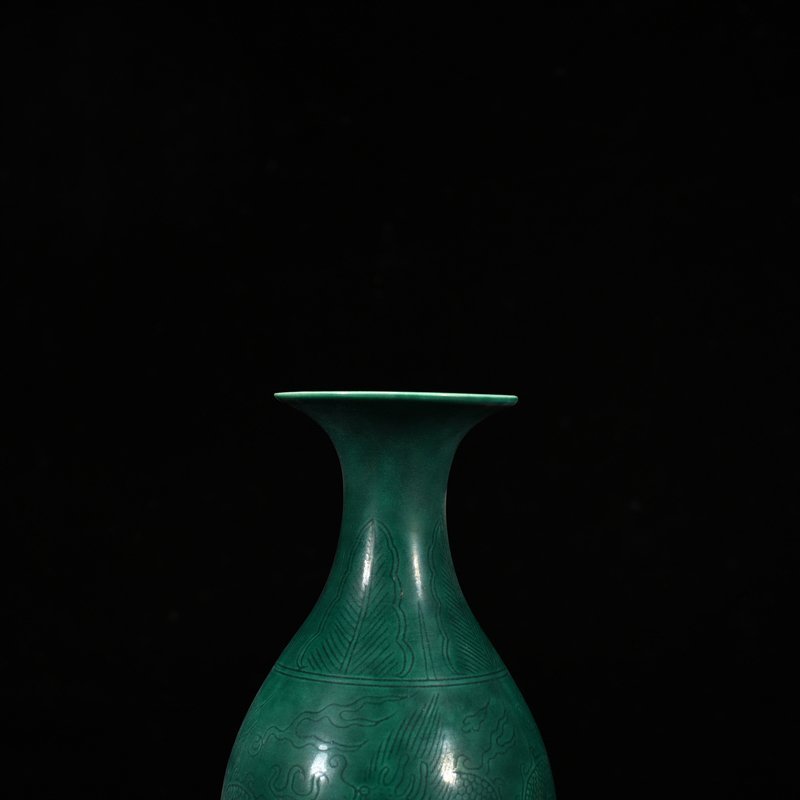 Qing Dynasty Qianlong peacock blue glaze jade pot spring vase with carved dragon pattern