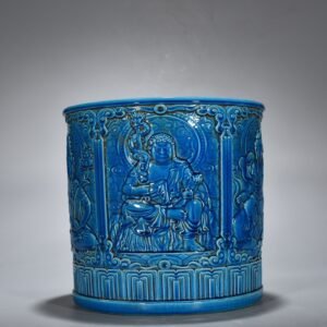 Qing Dynasty Qianlong peacock blue glaze carved Buddha figure pen holder