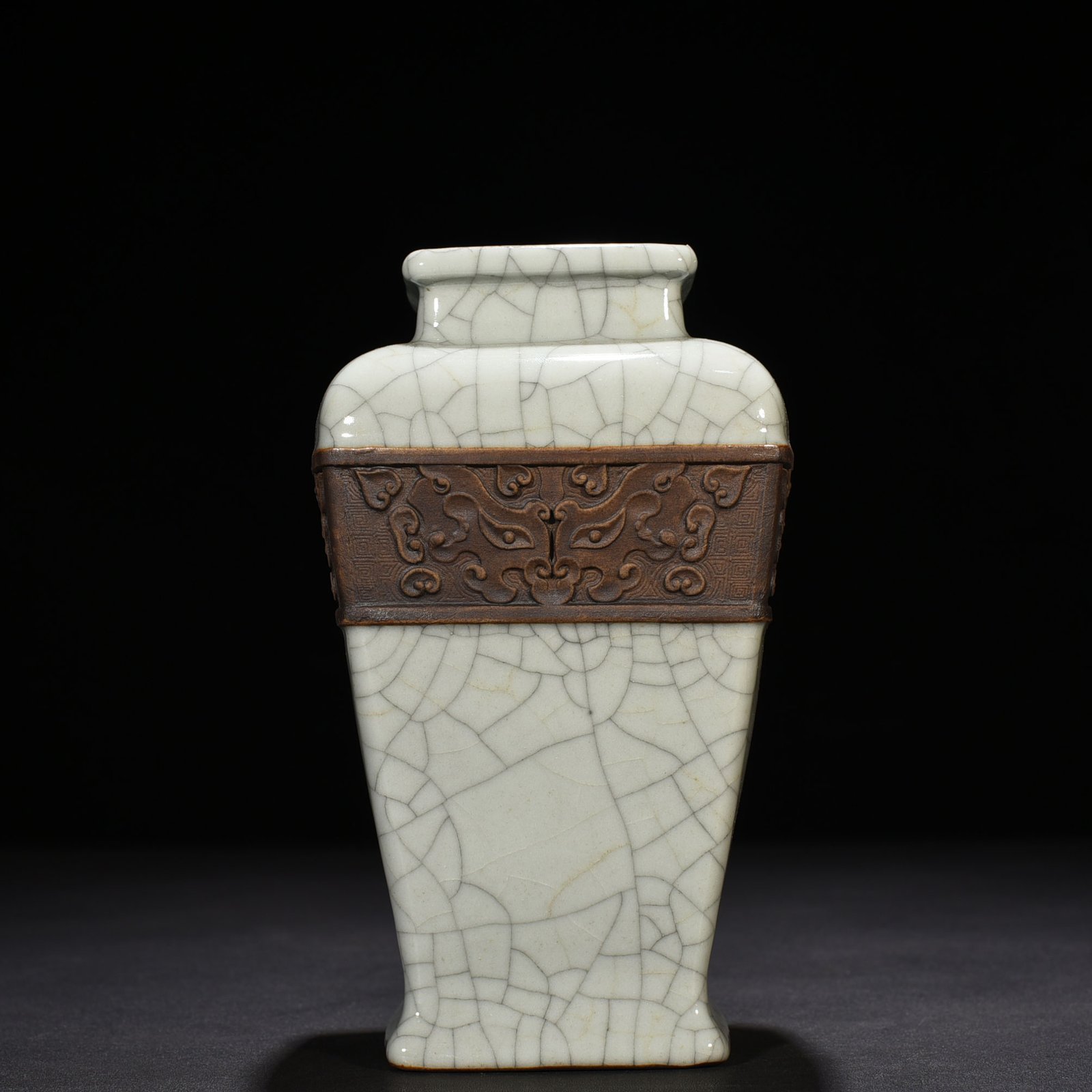 Qing Dynasty Qianlong official kiln carved Taotie pattern square vase