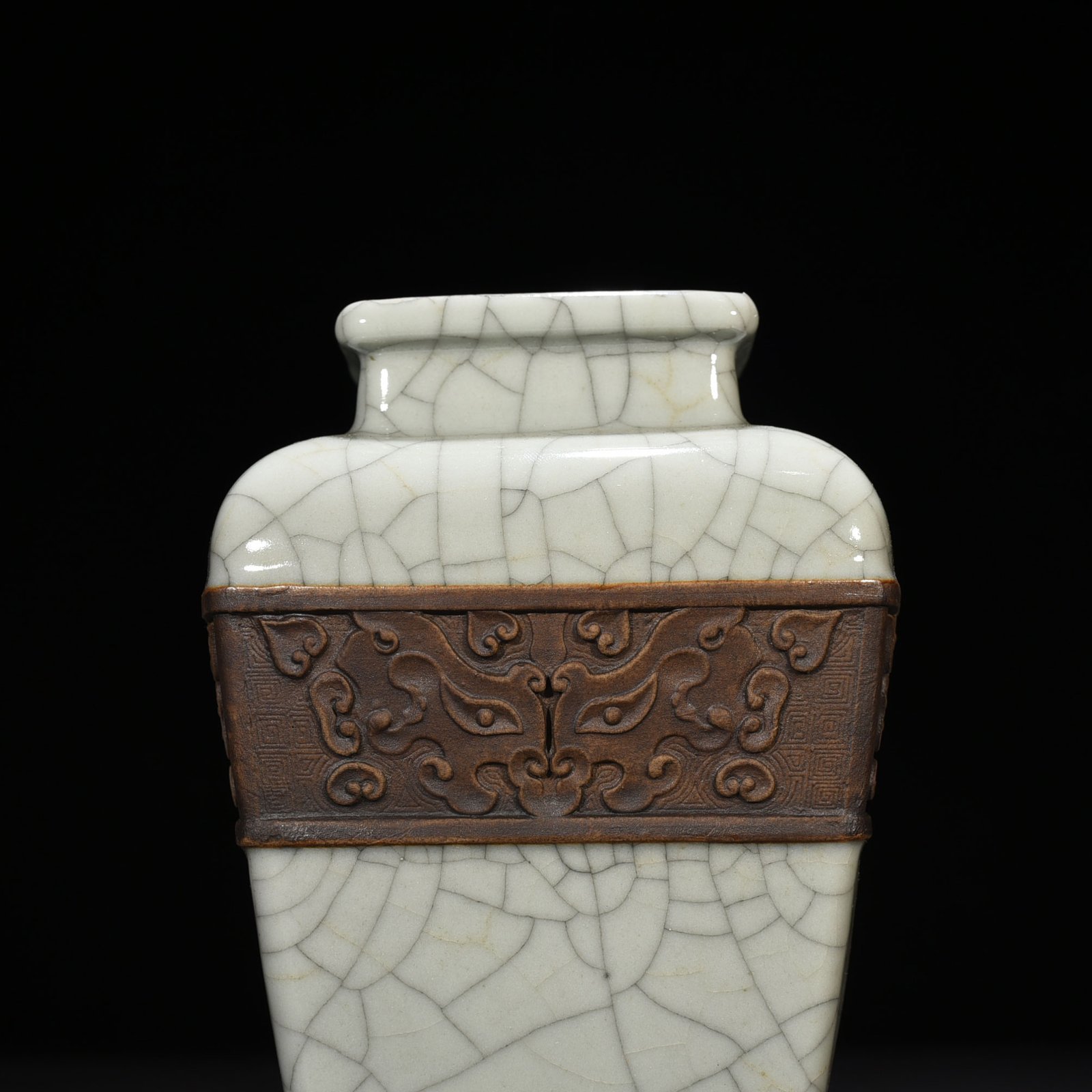 Qing Dynasty Qianlong official kiln carved Taotie pattern square vase