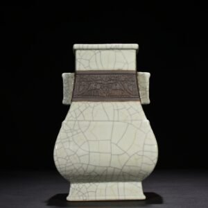 Qing Dynasty Qianlong official kiln carved Taotie pattern through the ear square vase