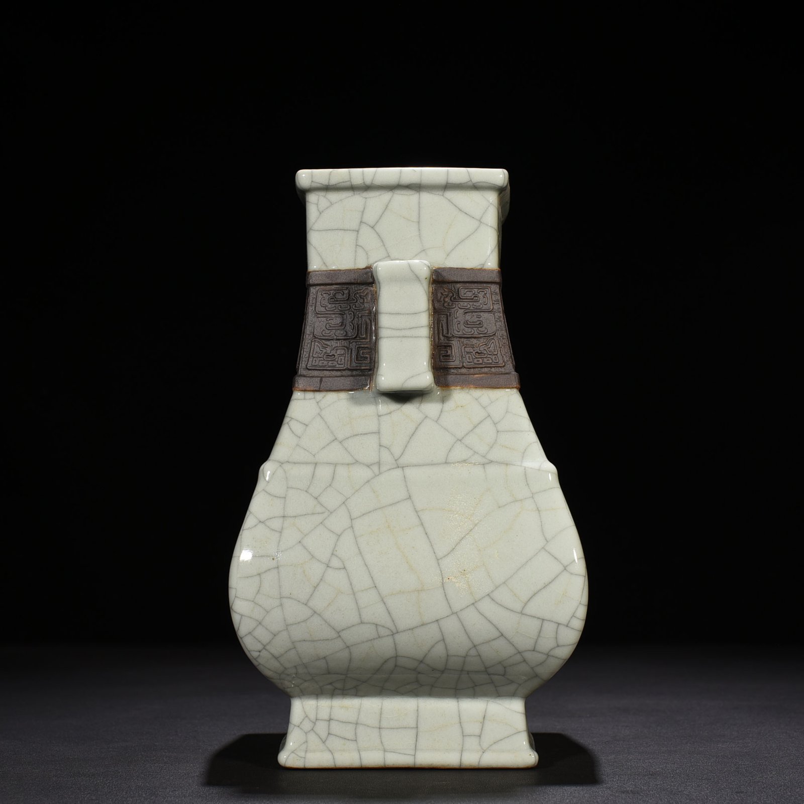Qing Dynasty Qianlong official kiln carved Taotie pattern through the ear square vase