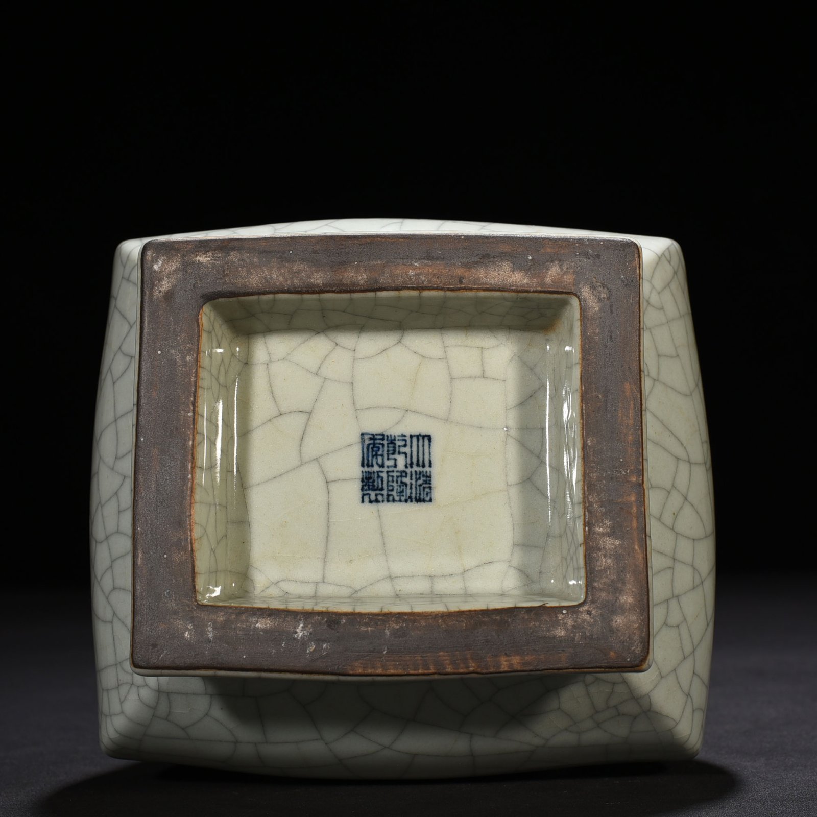 Qing Dynasty Qianlong official kiln carved Taotie pattern through the ear square vase