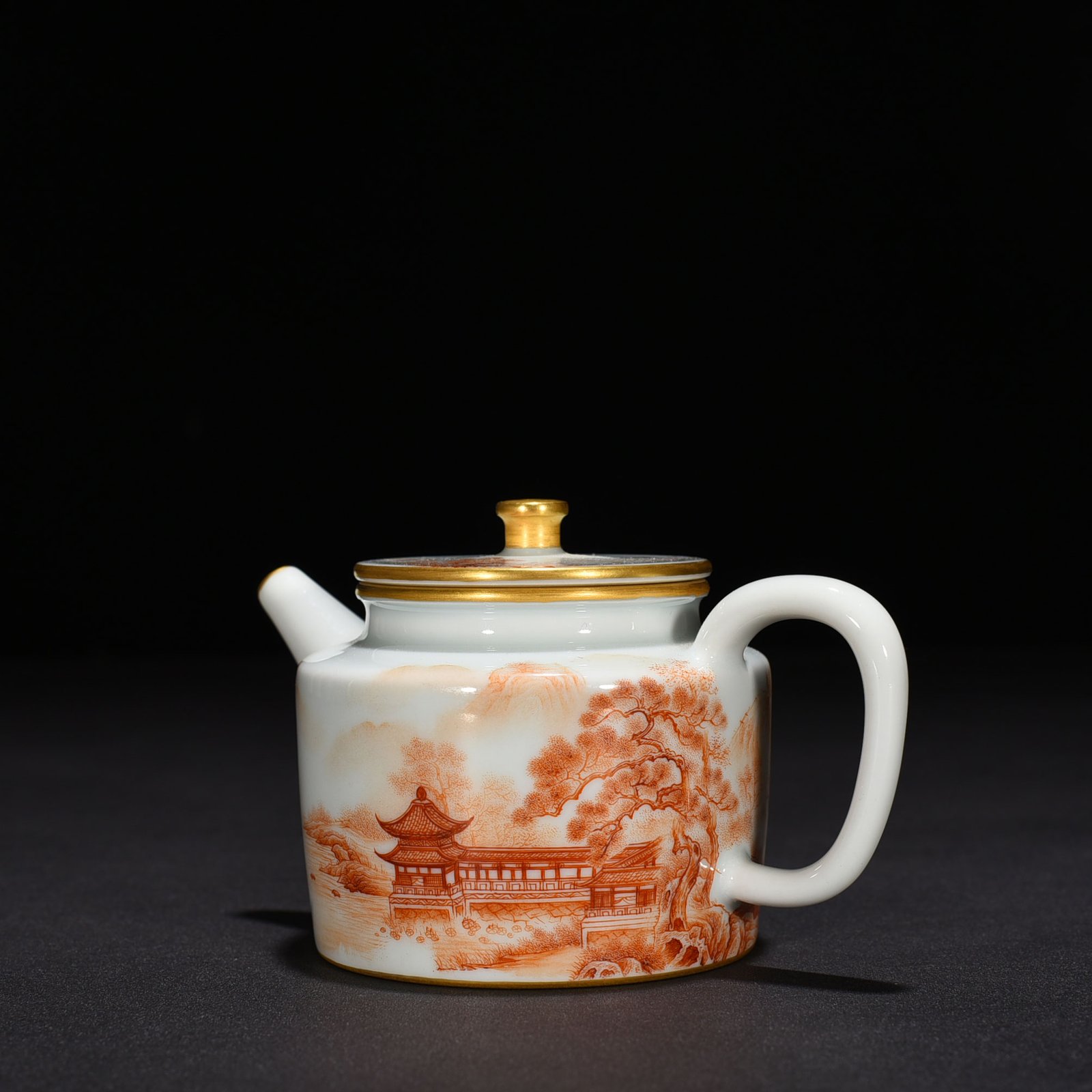 Qing Dynasty Qianlong iron-red landscape and pavilion pattern teapot