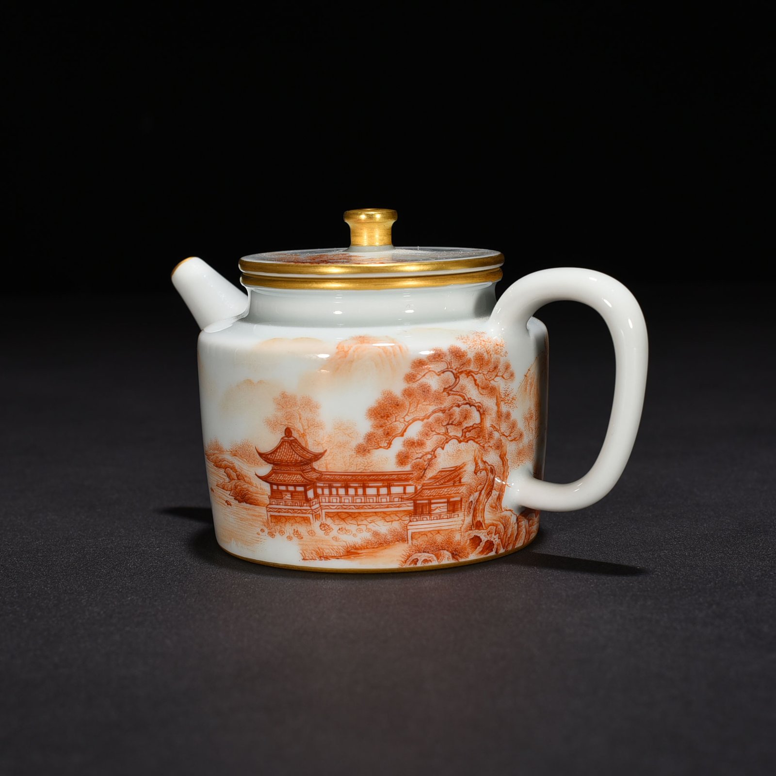 Qing Dynasty Qianlong iron-red landscape and pavilion pattern teapot