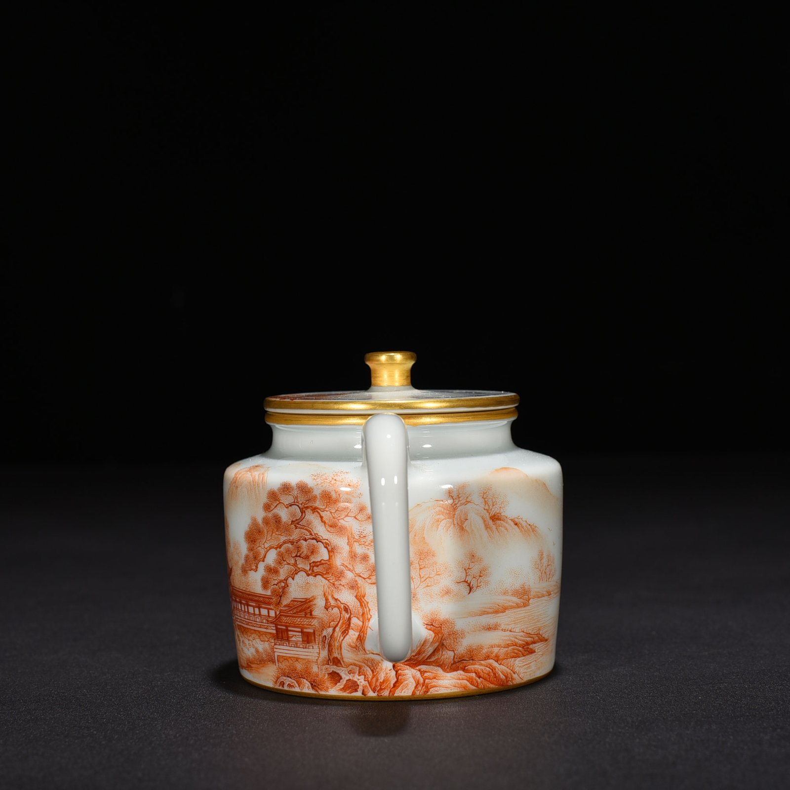 Qing Dynasty Qianlong iron-red landscape and pavilion pattern teapot