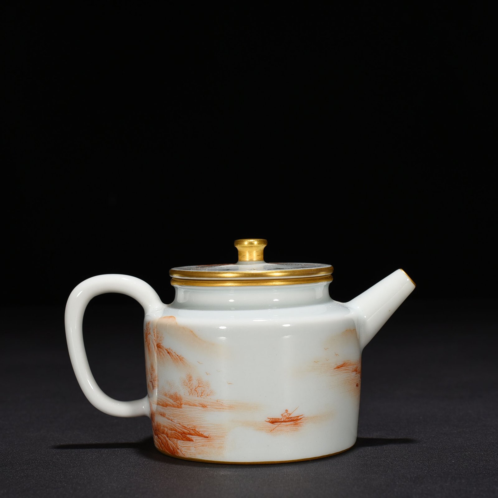 Qing Dynasty Qianlong iron-red landscape and pavilion pattern teapot