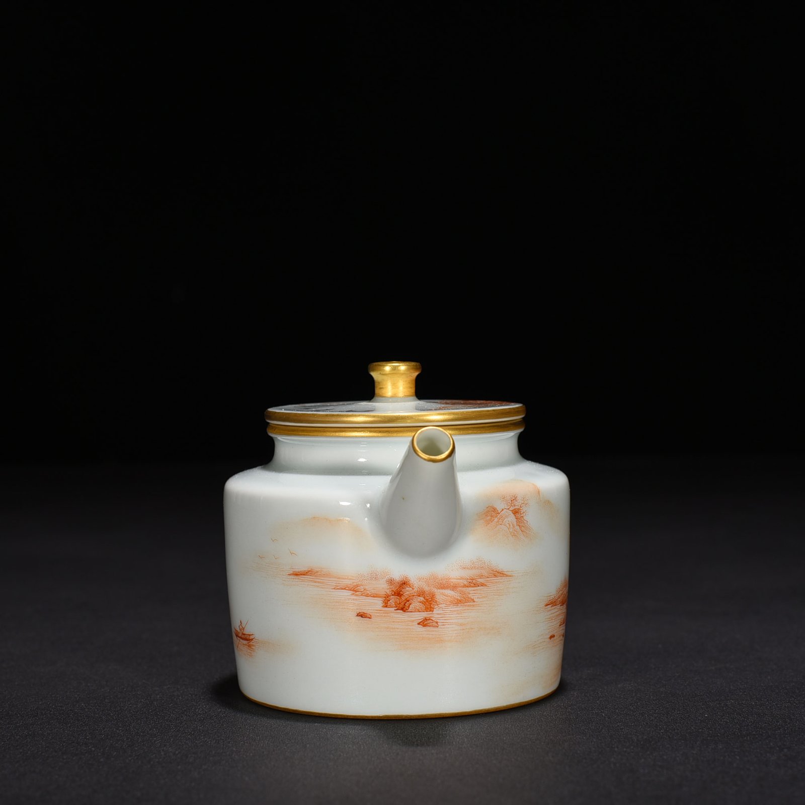 Qing Dynasty Qianlong iron-red landscape and pavilion pattern teapot
