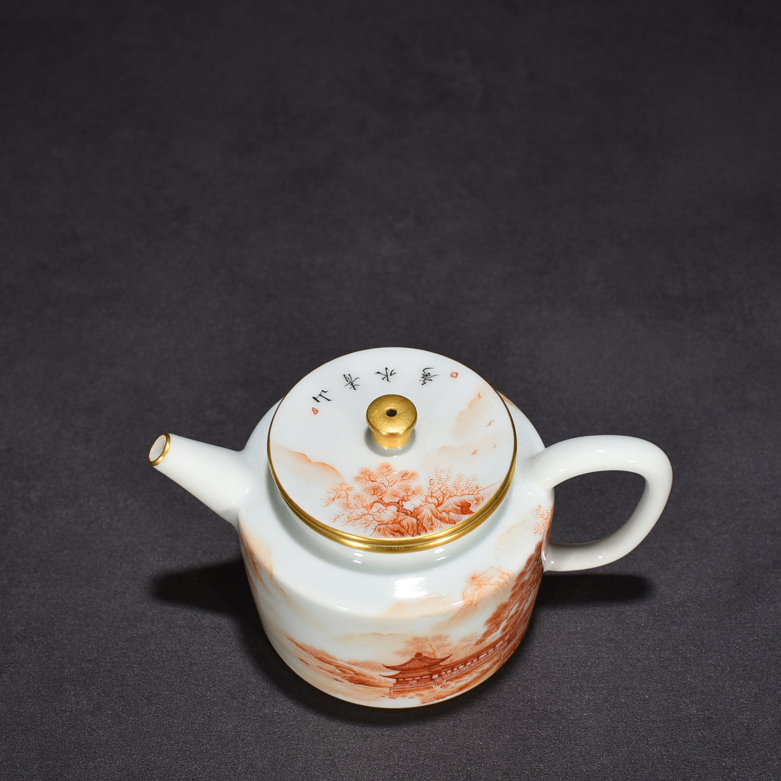Qing Dynasty Qianlong iron-red landscape and pavilion pattern teapot
