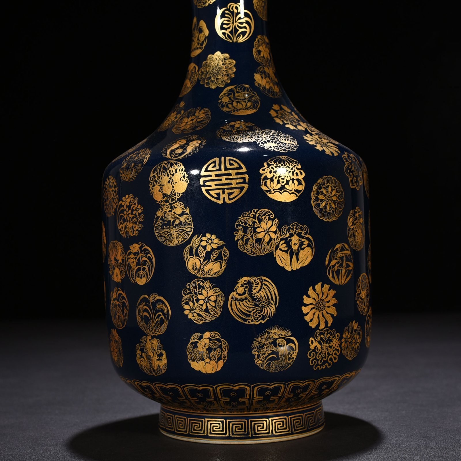Qing Dynasty Emperor Qianlong imperial blue glaze gold leather ball pattern garlic vase