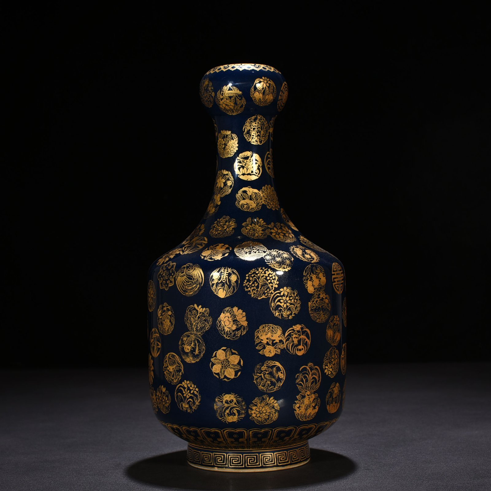 Qing Dynasty Emperor Qianlong imperial blue glaze gold leather ball pattern garlic vase