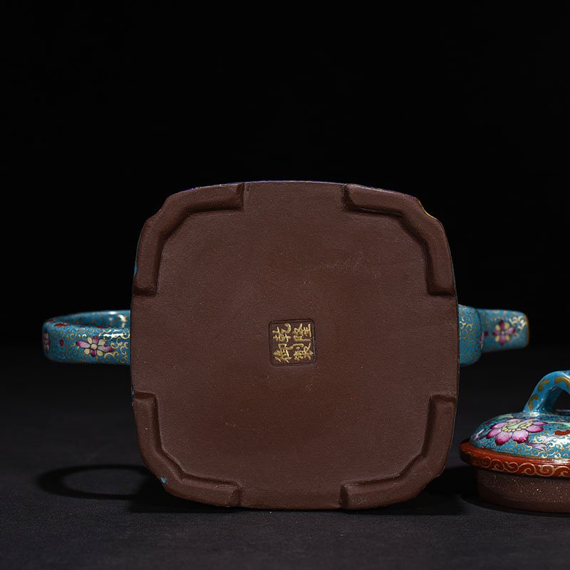 Qing Dynasty Qianlong Purple clay pastel teapot with human figures
