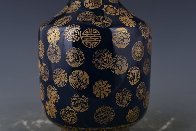 Qing Dynasty Emperor Qianlong imperial blue-glazed garlic vase with gold leather ball pattern