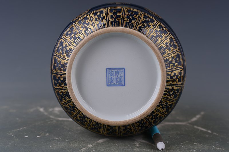 Qing Dynasty Emperor Qianlong imperial blue-glazed garlic vase with gold leather ball pattern