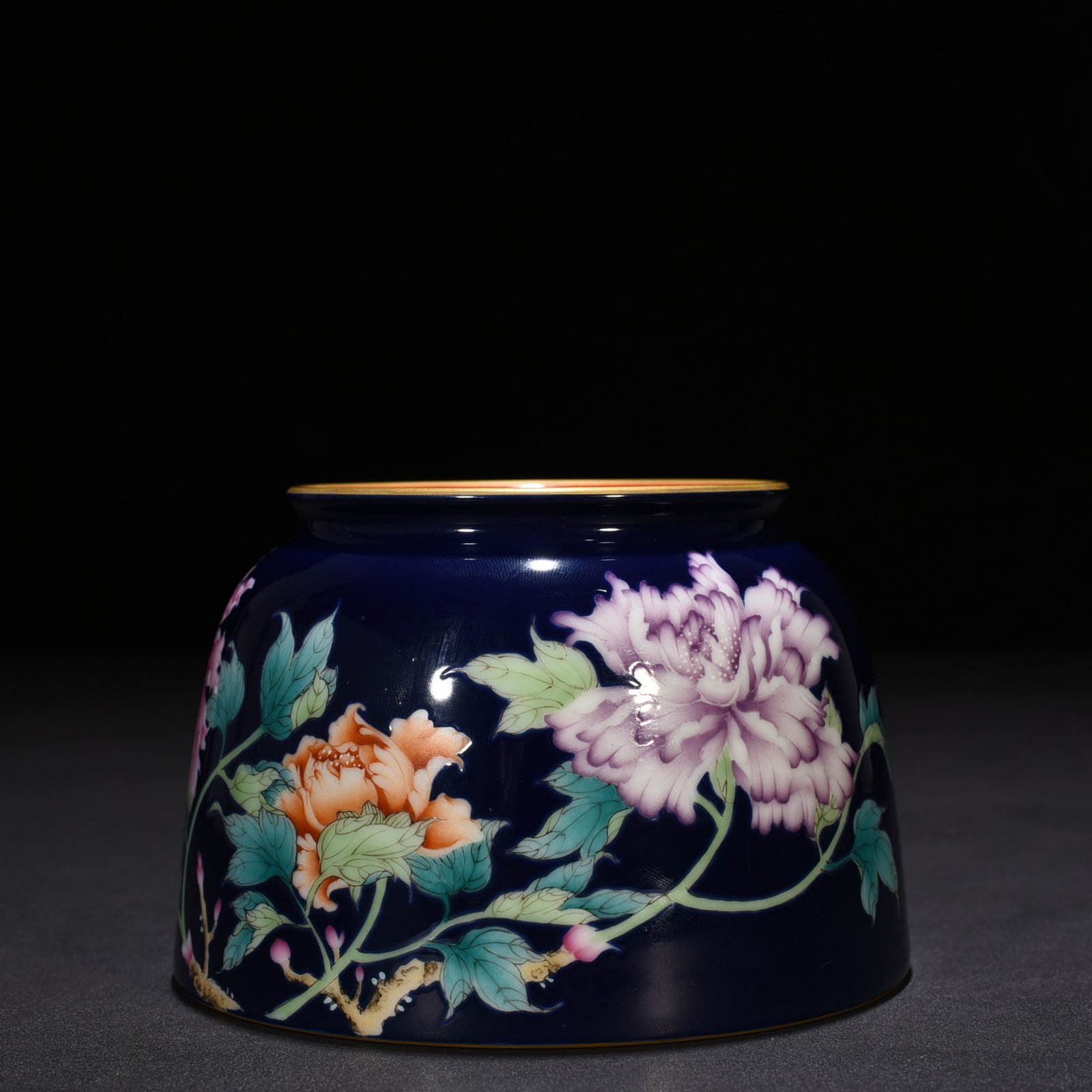 Qing Dynasty Qianlong imperial inscription blue ground enamel floral and peony pattern horseshoe statue